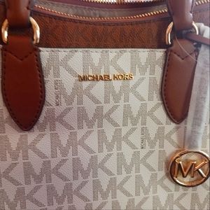 Michael korrs brand new. Tags still